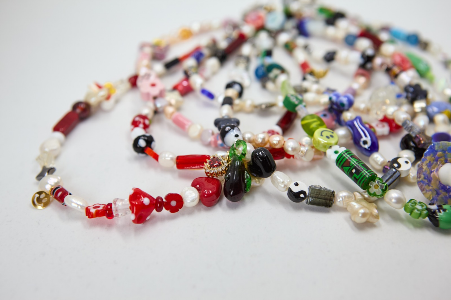 Red Mushy Necklace with other Fast Talker necklaces